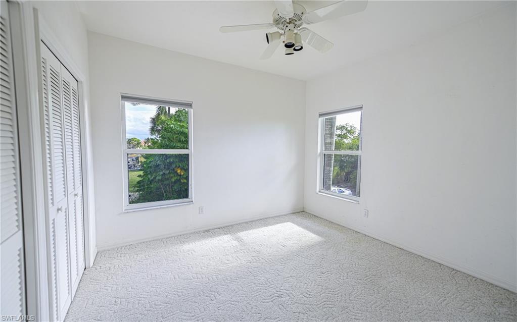 3858 Riviera Circle Bonita Springs, FL 34134 - Photo 11 of 34 an empty room with a window