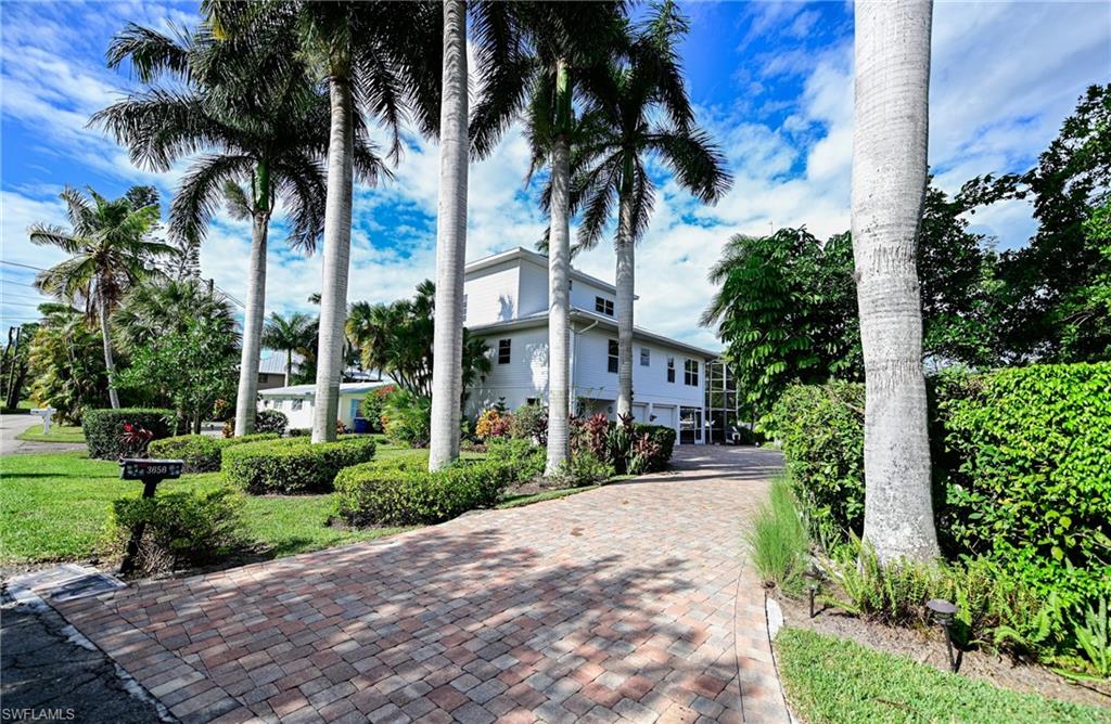 3858 Riviera Circle Bonita Springs, FL 34134 - Photo 2 of 34 a view of a park with a palm trees