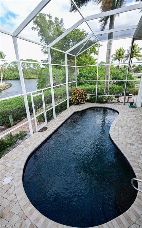 3858 Riviera Circle Bonita Springs, FL 34134 - Photo 25 of 34 a view of outdoor space with porch