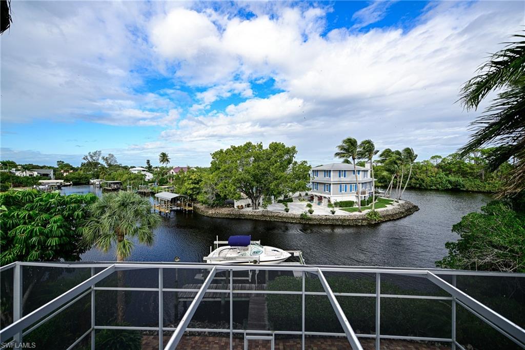 3858 Riviera Circle Bonita Springs, FL 34134 - Photo 3 of 34 a view of balcony with furniture