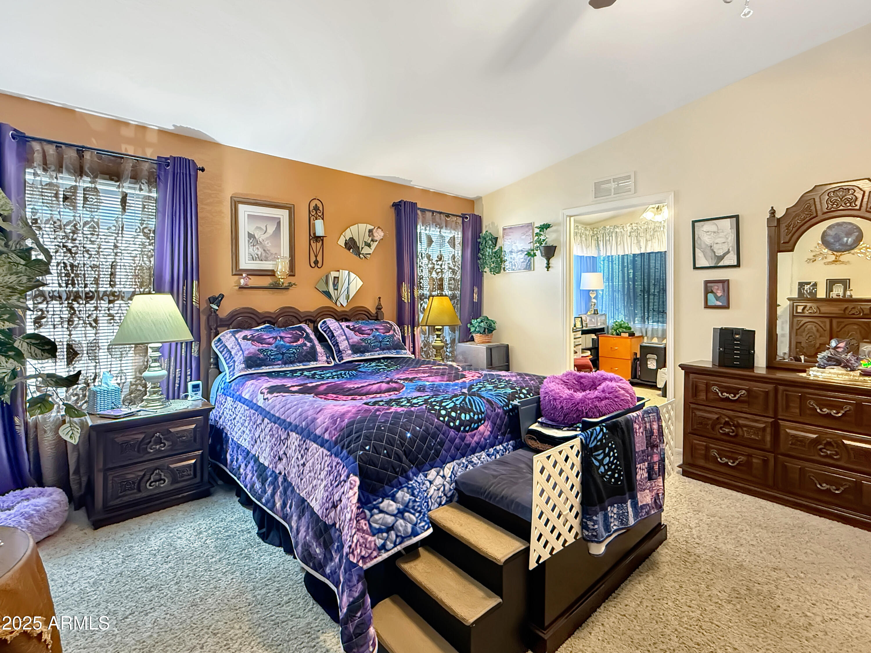 3700 South Tomahawk Road, Unit 102 Apache Junction, AZ 85119 - Photo 13 of 25 a bed room with a bed window and dresser
