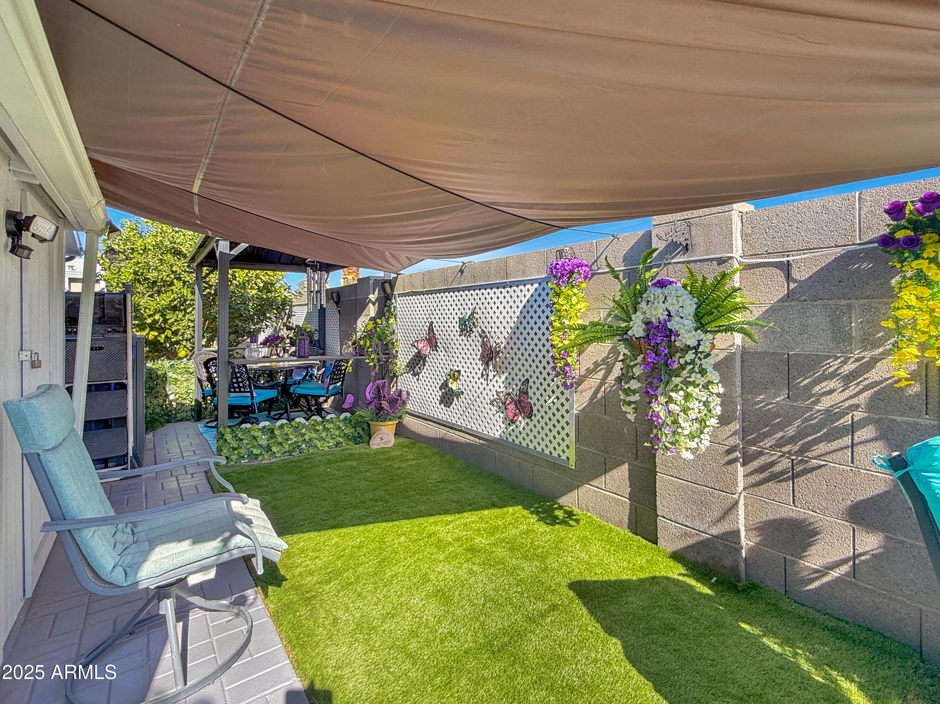 3700 South Tomahawk Road, Unit 102 Apache Junction, AZ 85119 - Photo 22 of 25 a view of outdoor space yard and patio