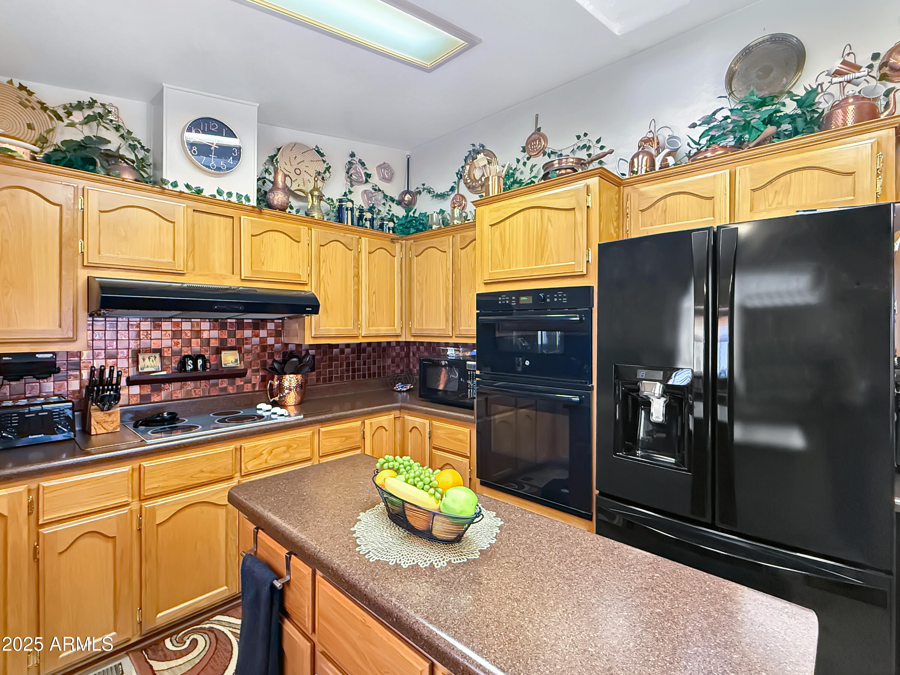 3700 South Tomahawk Road, Unit 102 Apache Junction, AZ 85119 - Photo 7 of 25 a kitchen with a sink refrigerator and microwave