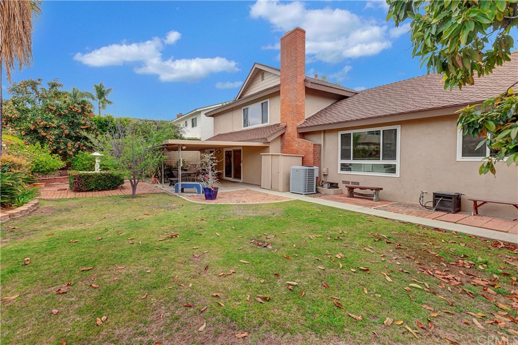 1645 Sandalwood Drive Brea, CA 92821 - Photo 16 of 16 a backyard of a house with table and chairs