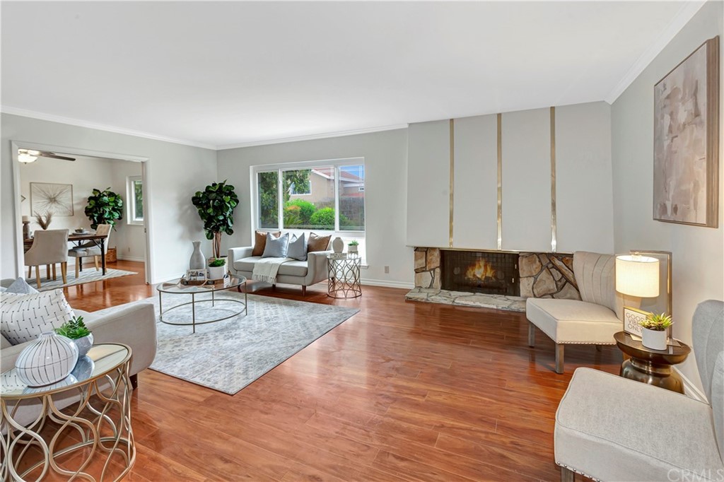 1645 Sandalwood Drive Brea, CA 92821 - Photo 2 of 16 a living room with furniture and a fireplace