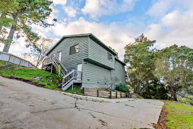 a house view with a garden space