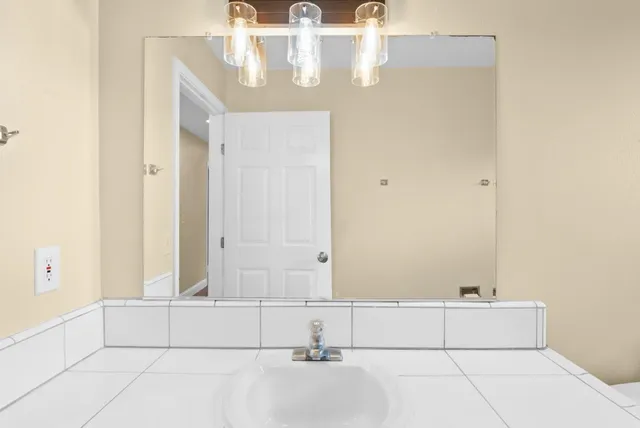 a bathroom with a bathtub and shower