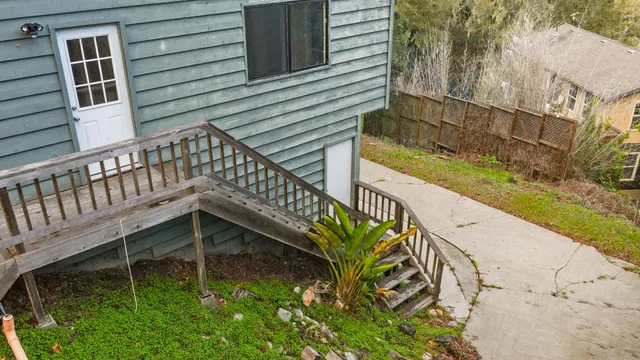 a view of stairs with wooden floor