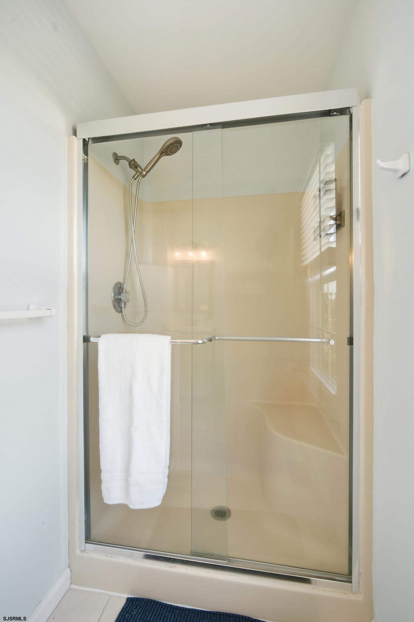 214 Hagen Road Brigantine, NJ 08203 - Photo 28 of 34 a bathroom with a shower