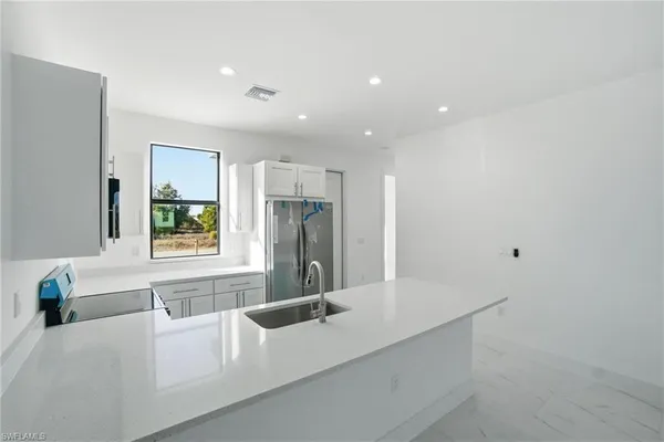 $1,700 | 2404-2406 Mae Avenue South, Lehigh Acres, FL 33973