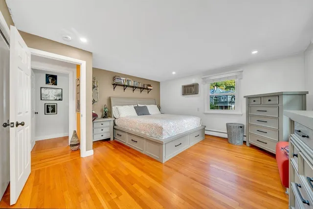 a bedroom with a bed and a cabinets