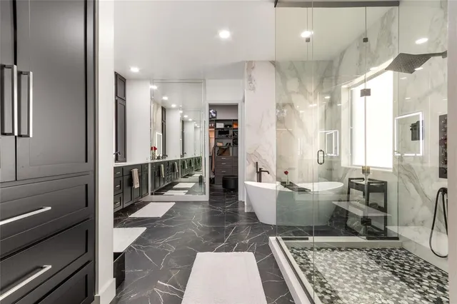 a large room with lots of wooden furniture and windows