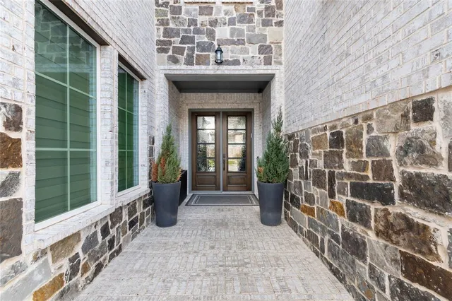 a view of a porch with a potted plant