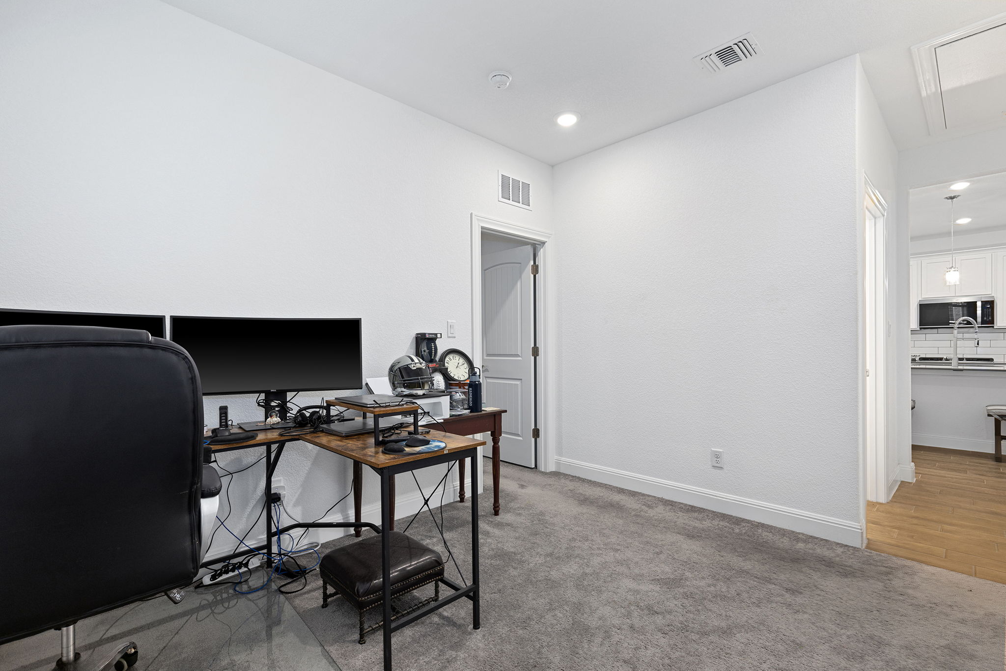 116 Raleigh Drive Georgetown, TX 78633 - Photo 16 of 28 An adaptable living space features soft carpeting and direct access to a well-appointed kitchen.