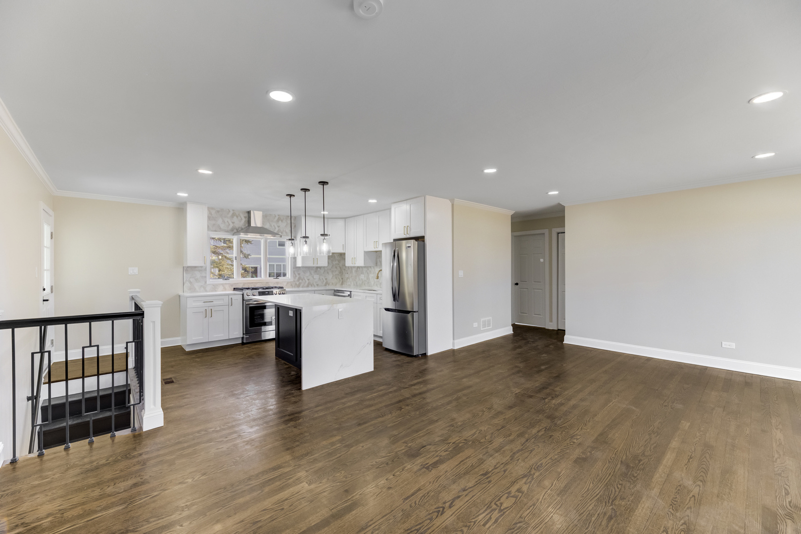 4701 Wolf Road Western Springs, IL 60558 - Photo 2 of 27 a view of a kitchen with refrigerator and wooden floor