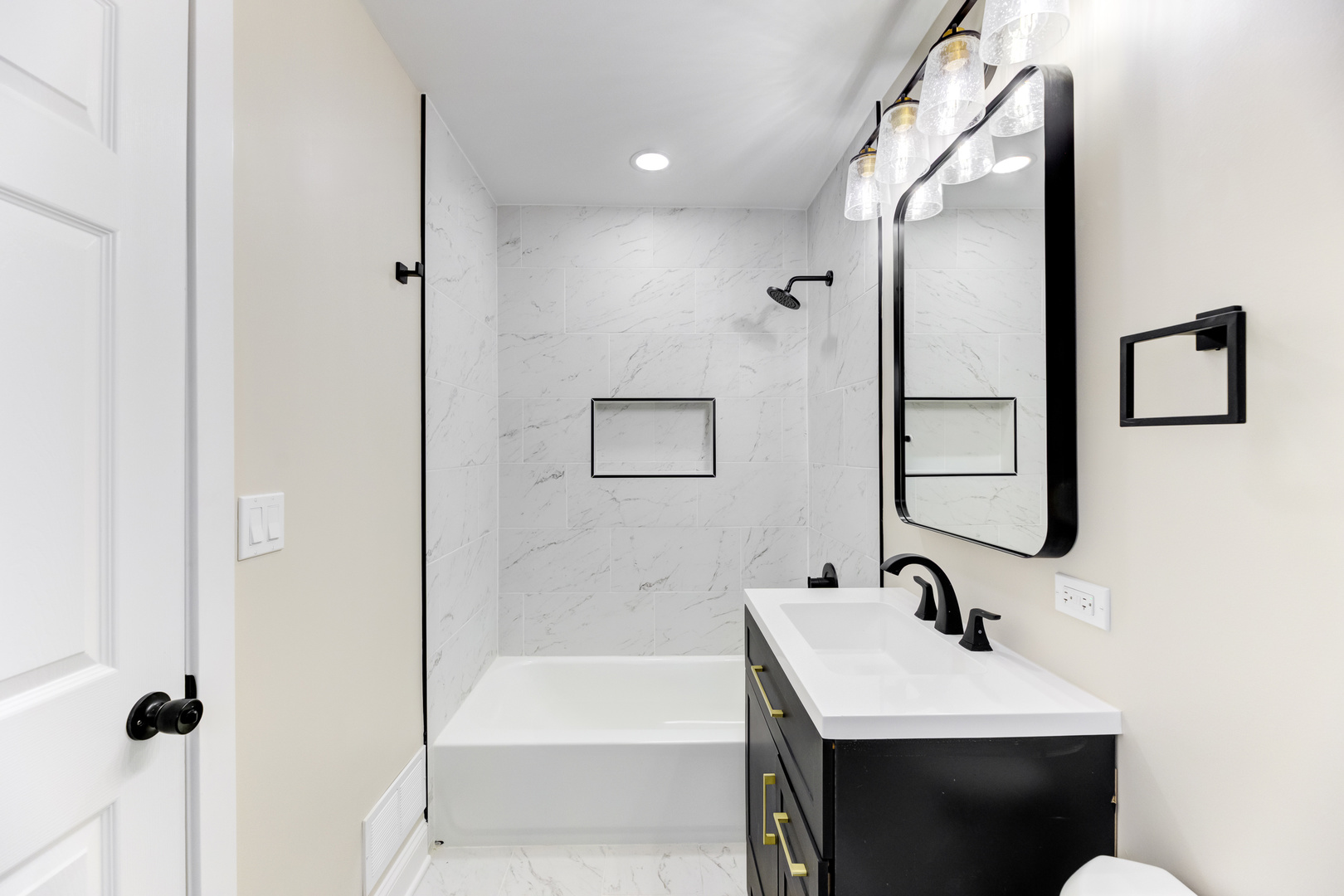 4701 Wolf Road Western Springs, IL 60558 - Photo 9 of 27 a bathroom with a sink and a mirror