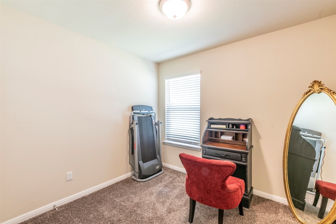 205 Pepper Mill Loop Burnet, TX 78611 - Photo 13 of 25 a room with furniture and a potted plant