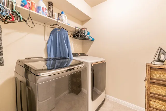 a close view of a sink and a stove in a kitchen