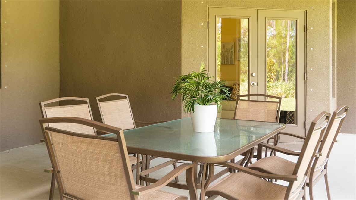 107 52nd Square Vero Beach, FL 32968 - Photo 14 of 20 a dining room with furniture and window
