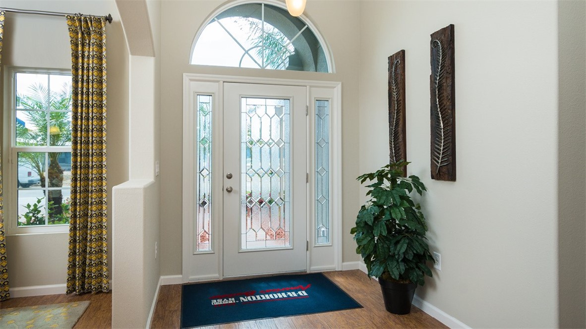 107 52nd Square Vero Beach, FL 32968 - Photo 4 of 20 a view of front door with glass door