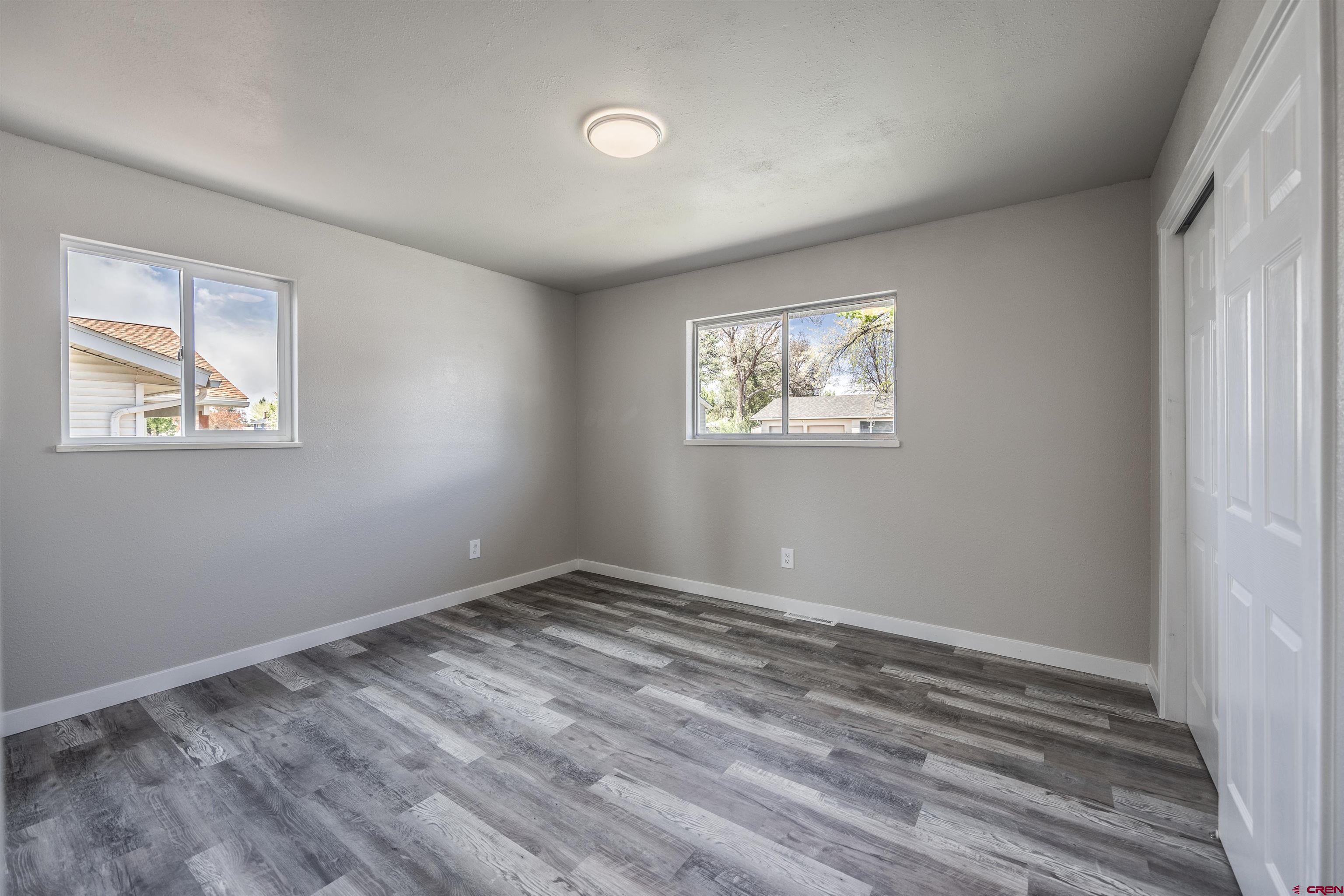2130 Devon Street Montrose, CO 81401 - Photo 10 of 27 a view of room with window and ceiling fan