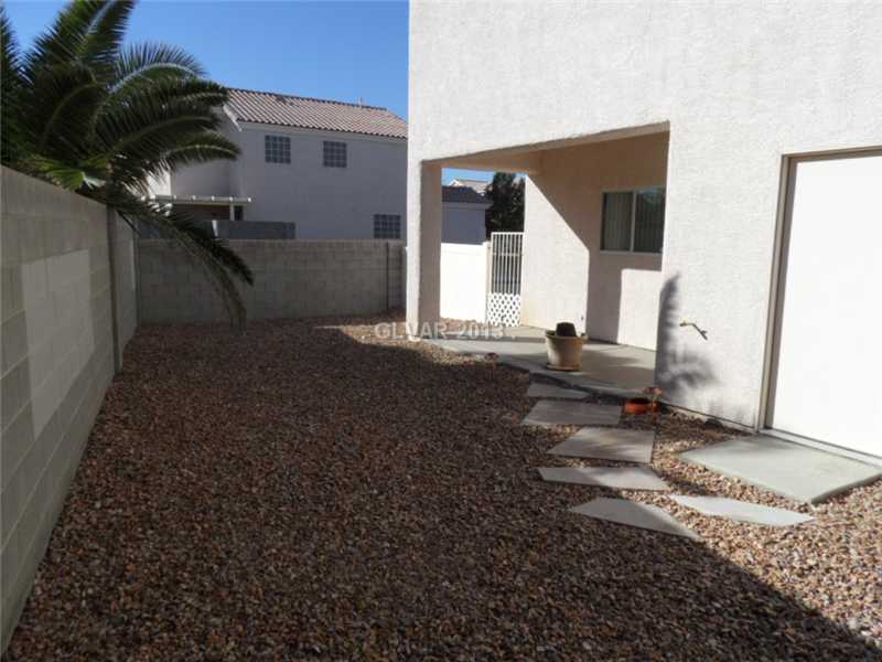 5864 Crumbling Ridge Street Henderson, NV 89011 - Photo 3 of 14 Exterior Back. Covered Patio