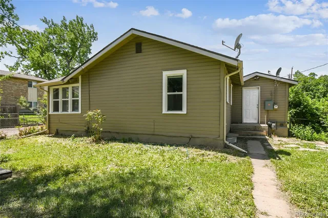 a house view with a garden space