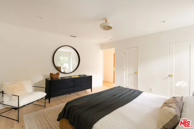 a view of a bathroom from a hallway