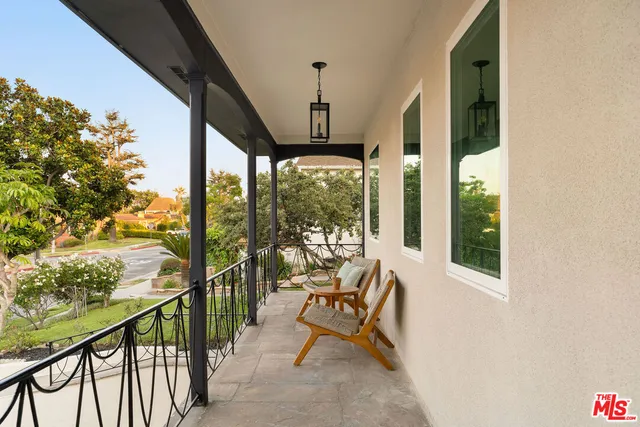 a view of a bedroom with furniture and tub