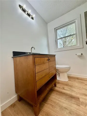 a bathroom with a sink and a toilet