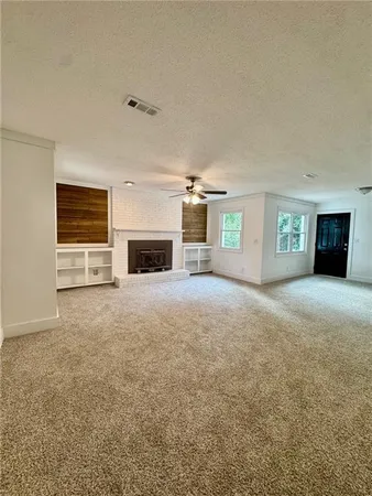 a view of a livingroom with a fireplace