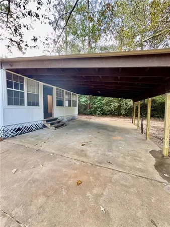 a view of backyard with a small cabin