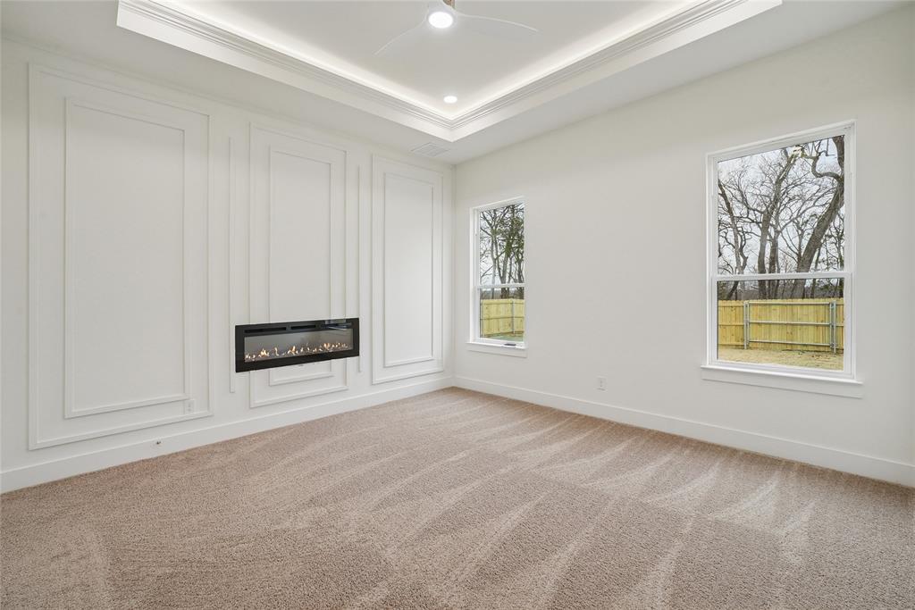1147 Riverwood Road Dallas, TX 75217 - Photo 14 of 26 an empty room with windows
