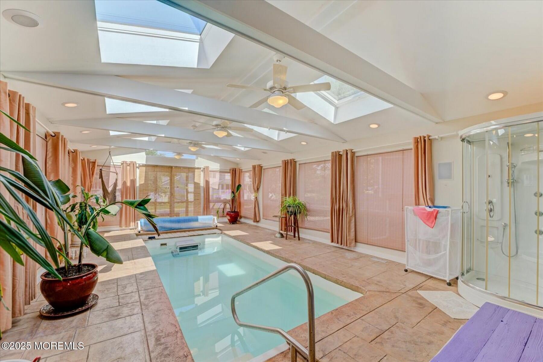 74 Seneca Place Oceanport, NJ 07757 - Photo 12 of 45 a living room with patio furniture and a potted plant