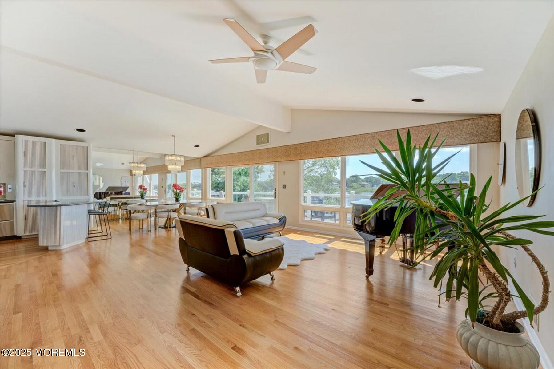 74 Seneca Place Oceanport, NJ 07757 - Photo 18 of 45 a living room with furniture a potted plant and a large window