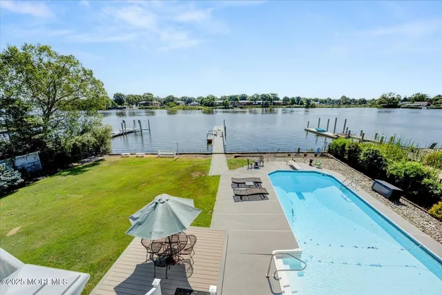 a view of a lake with a outdoor space