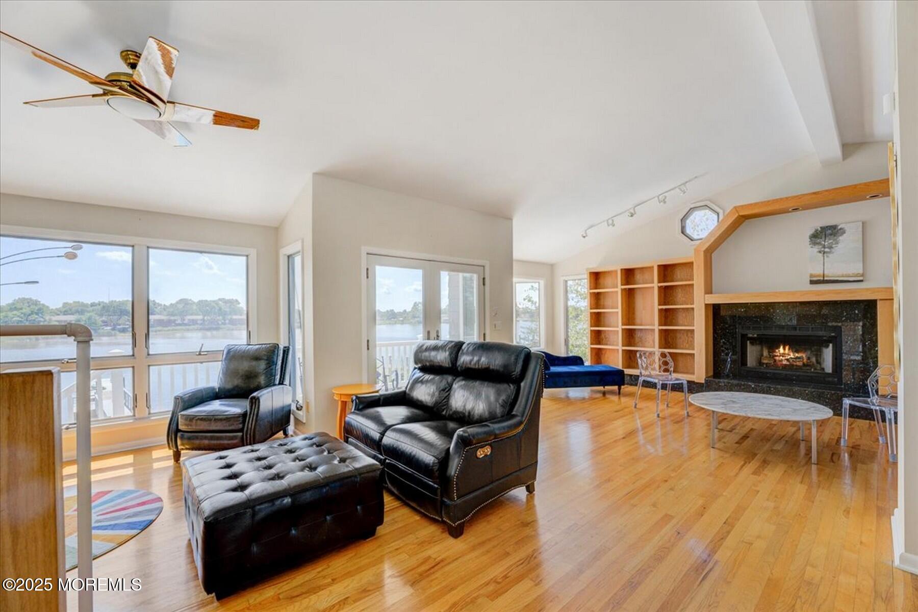 74 Seneca Place Oceanport, NJ 07757 - Photo 25 of 45 a living room with furniture and a fireplace