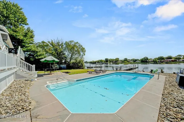 a front view of a house with swimming pool