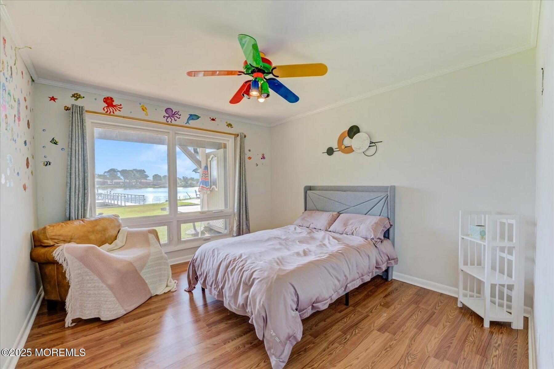 74 Seneca Place Oceanport, NJ 07757 - Photo 31 of 45 a bedroom with a bed and a large window