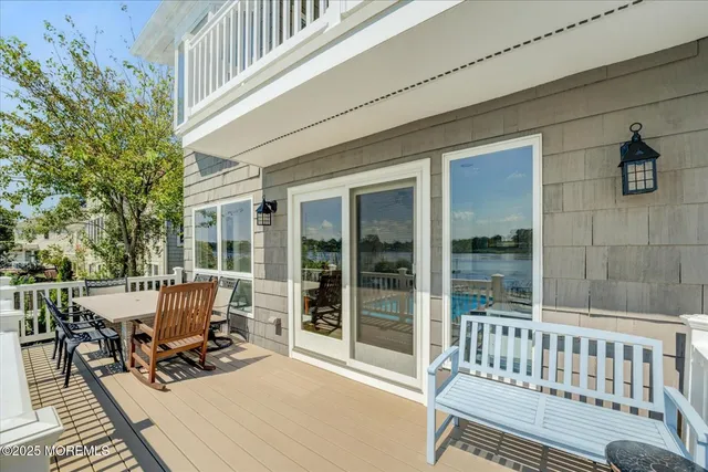 a view of a house with a yard and tree s