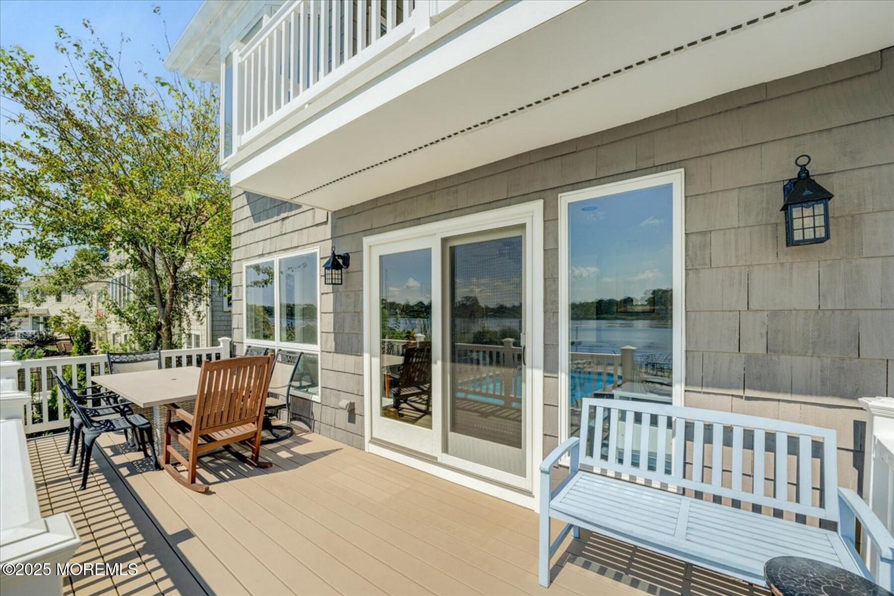 74 Seneca Place Oceanport, NJ 07757 - Photo 4 of 45 a view of a patio with a table and chairs