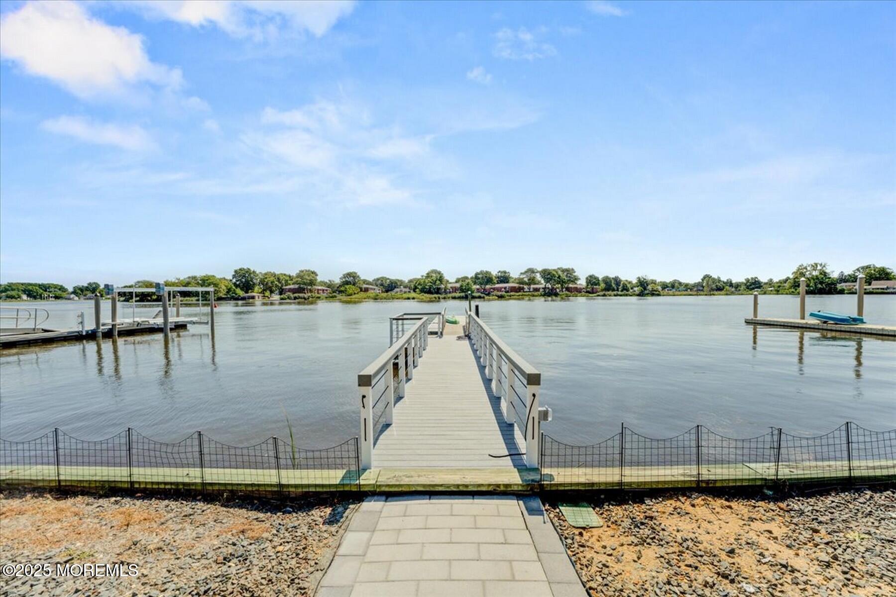 74 Seneca Place Oceanport, NJ 07757 - Photo 5 of 45 a view of a lake with a outdoor space