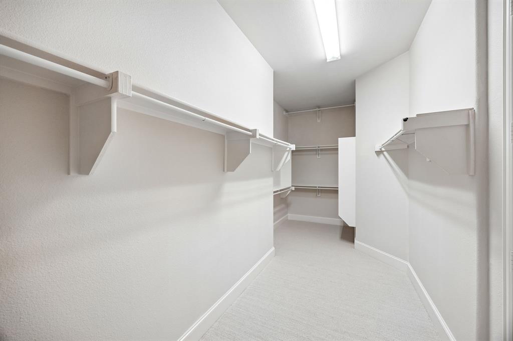1567 Red Rock Canyon Road Frisco, TX 75036 - Photo 22 of 36 Primary walk-in closet.