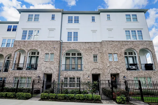 a front view of a house with yard