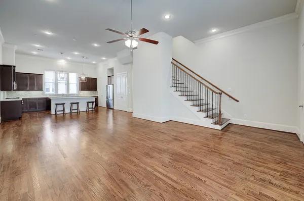 a view of kitchen with furniture and wooden floor