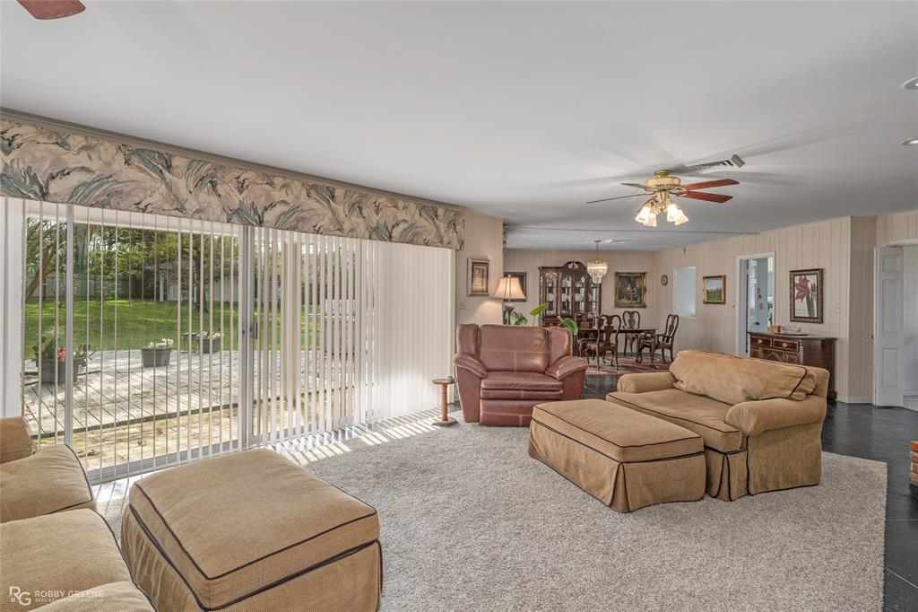 701 Palmetto Road Benton, LA 71006 - Photo 4 of 28 a living room with furniture and a large window