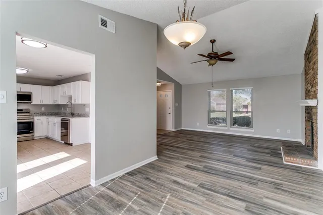 a view of kitchen and windows