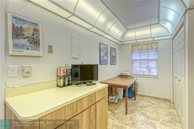 a room with a table and chairs