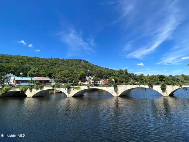 a view of city view with swimming pool and lake view
