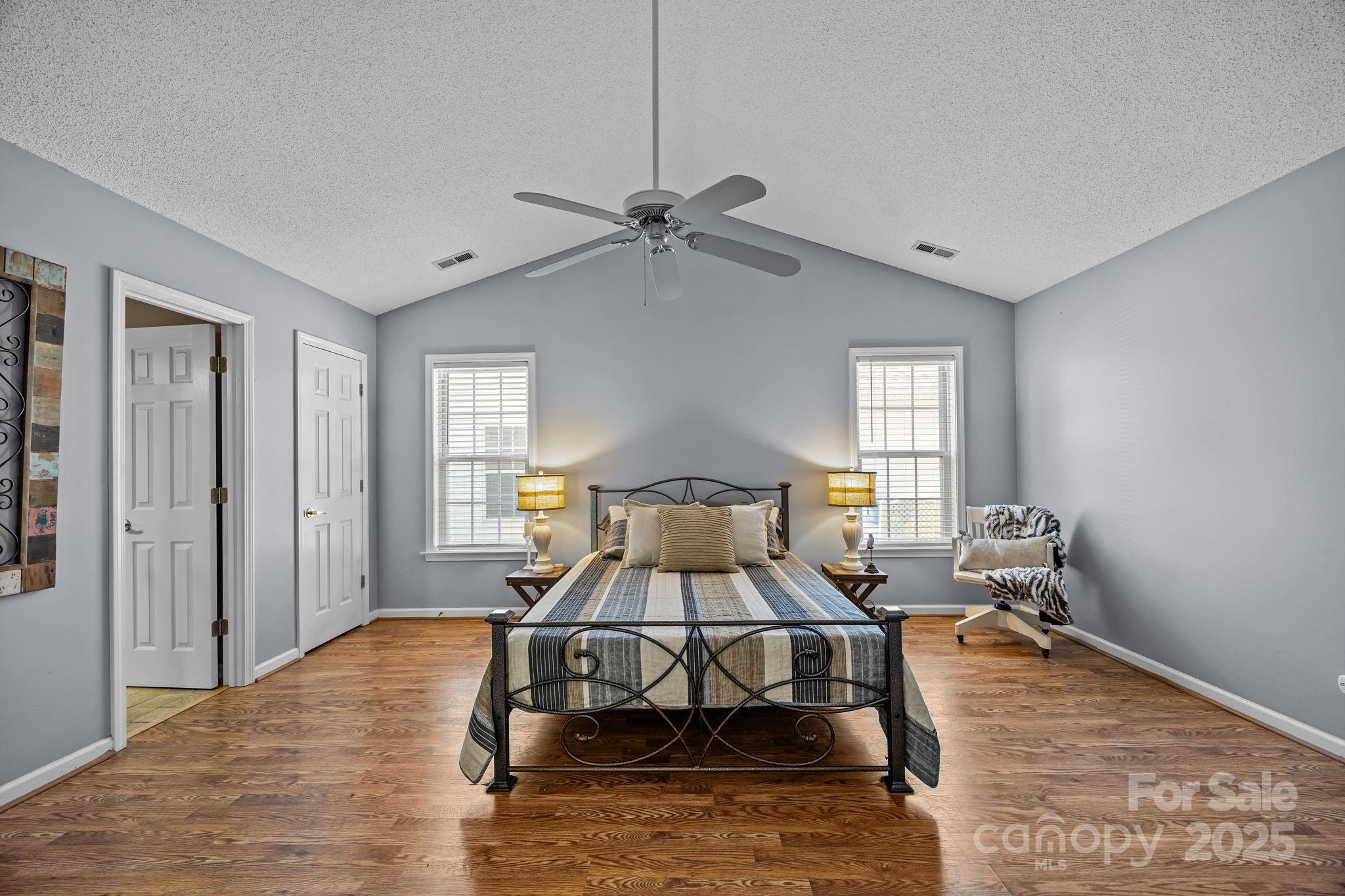 255 Stonehollow Road Fletcher, NC 28732 - Photo 15 of 32 a living room with a couch chairs and a chandelier